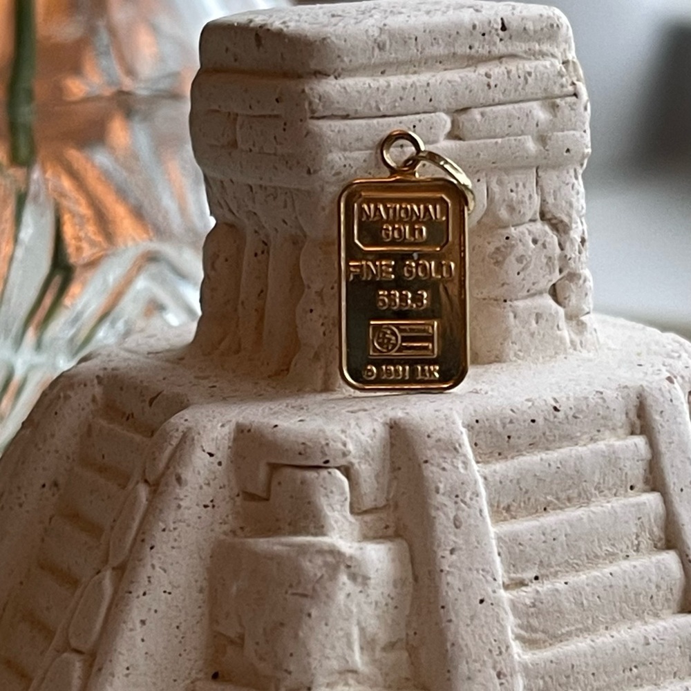 Tiny 14k gold charm